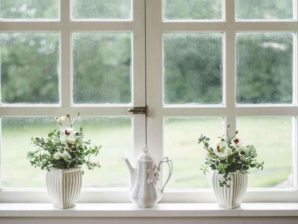 Flower pots on windowsill